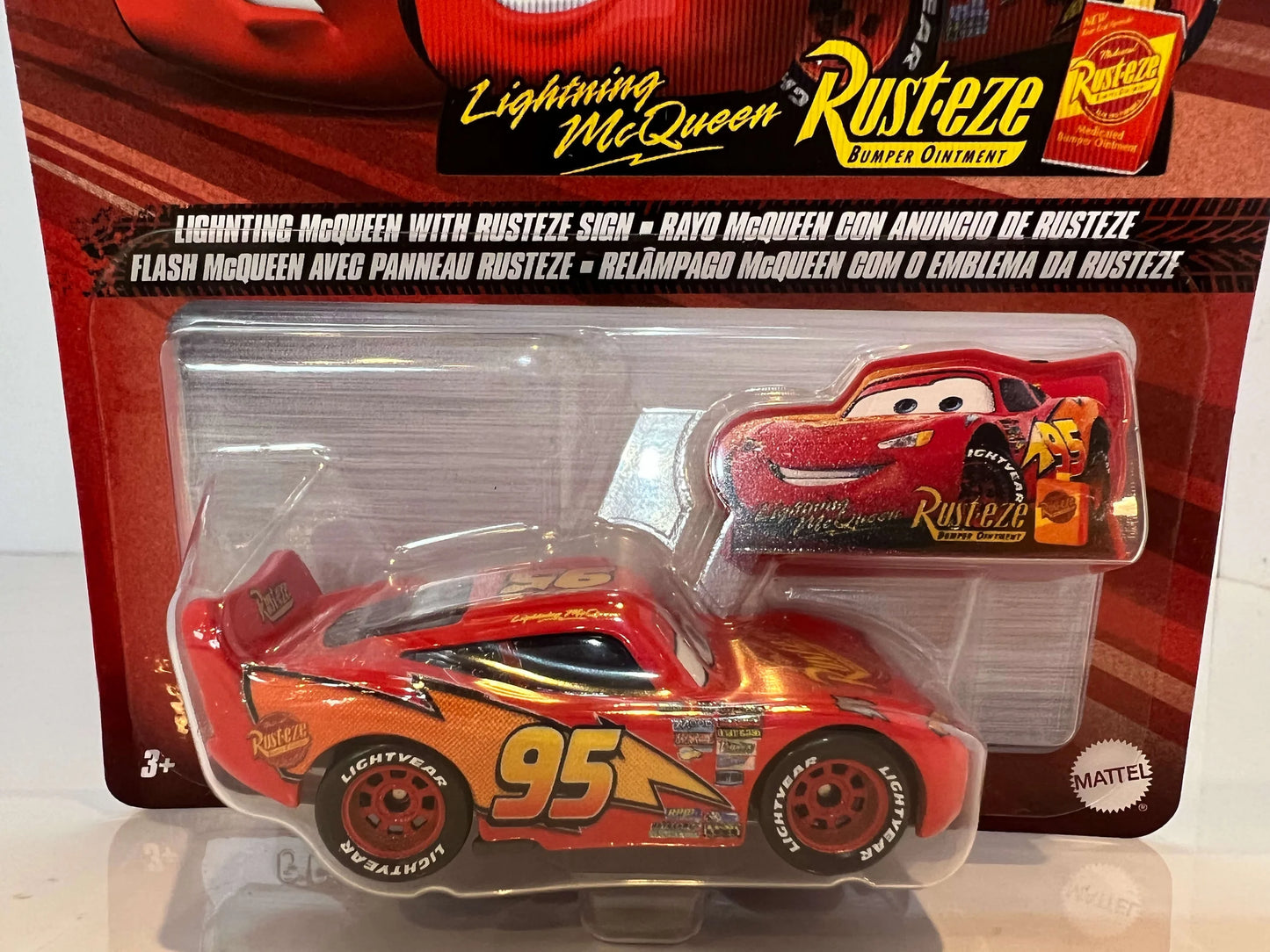 LIGHTNING McQUEEN WITH RUSTEZE SIGN (2022)
