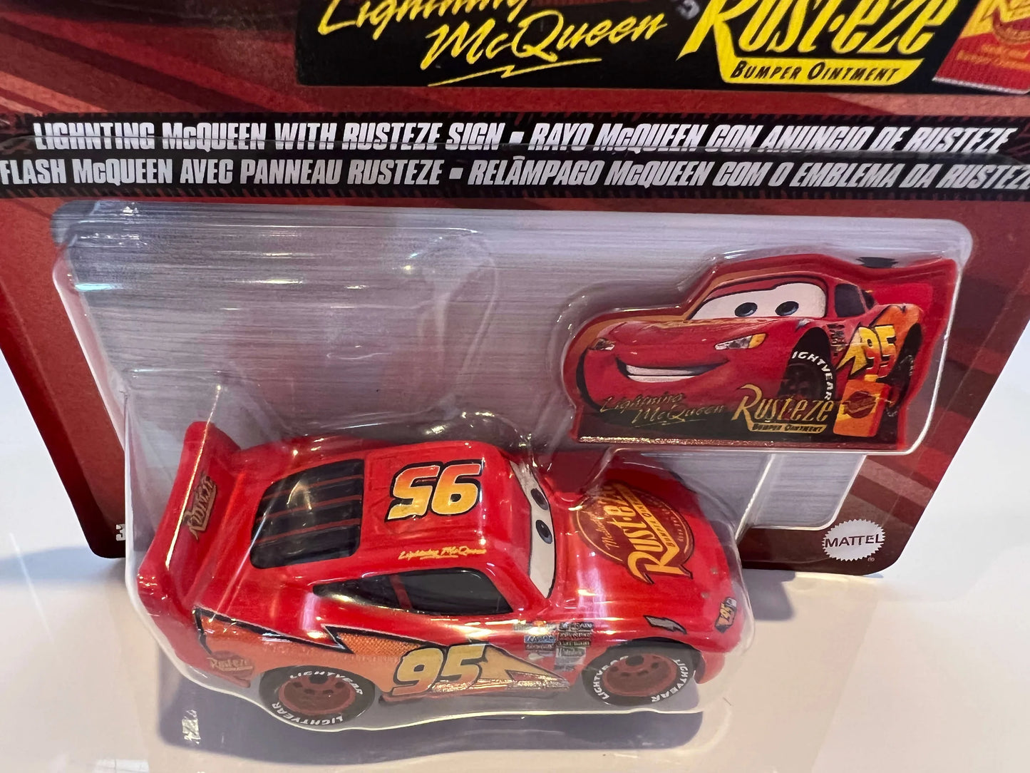 LIGHTNING McQUEEN WITH RUSTEZE SIGN (2022)
